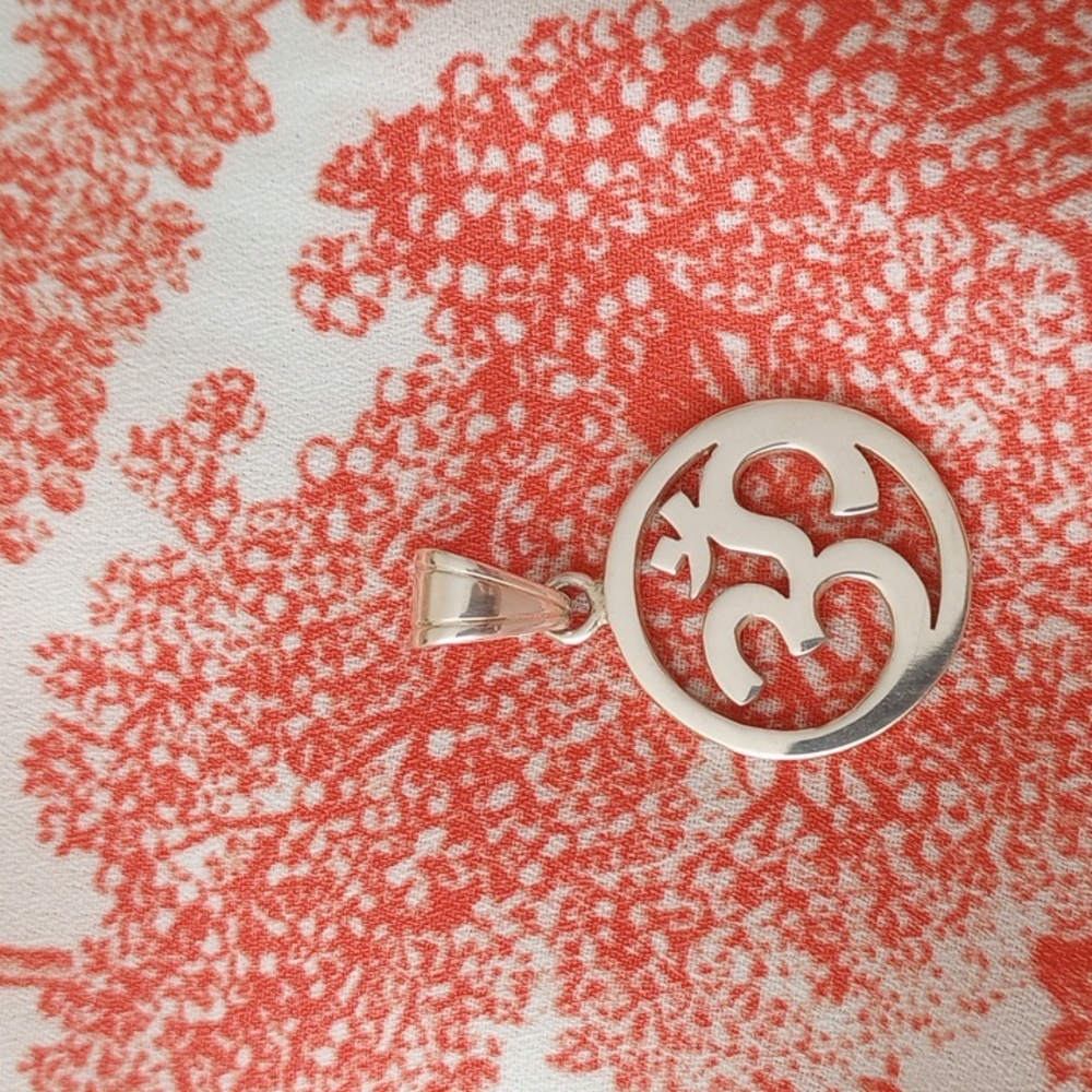 NWOT OM Silver Pendant .